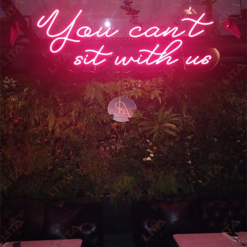 You Can Sit With Us Neon Sign